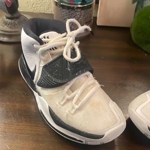 White and Black Nike Kyrie basketball shoes